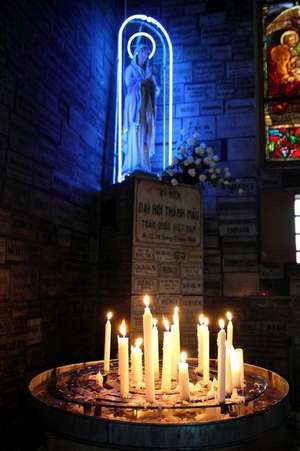 Mother Mary Statue and Candles in Notre Dame Basilica Cathedral Saigon Vietnam Journal de Cs Creations