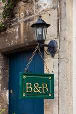 B & B - Bed and Breakfast Sign Board in English Village Journal