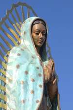 Graceful Our Lady of Guadalupe Sculpture in Santa Fe New Mexico USA Journal